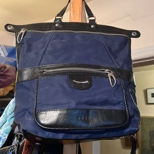 Tusk navy canvas black leather backpack